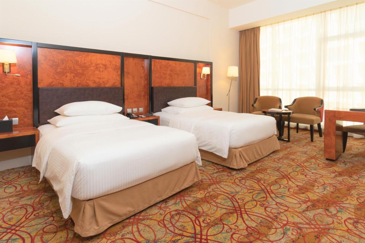 Deluxe Twin Room complimentary shuttle to DXB Airport Terminal 1 & 3 on all hotel operated F&B outlets