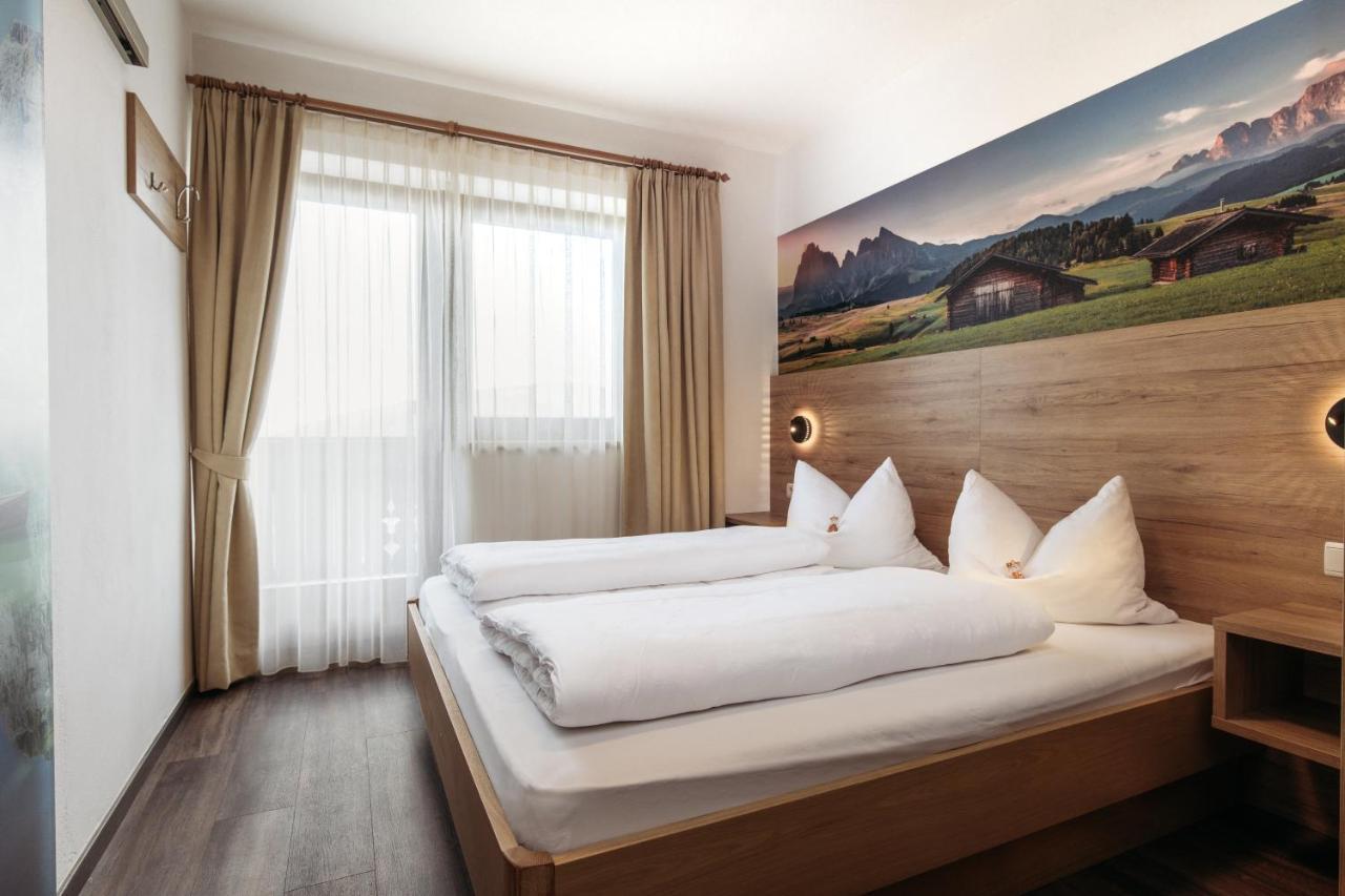 Double Room with Balcony (2 Adults + 1 Child),1231978025:JPEG
