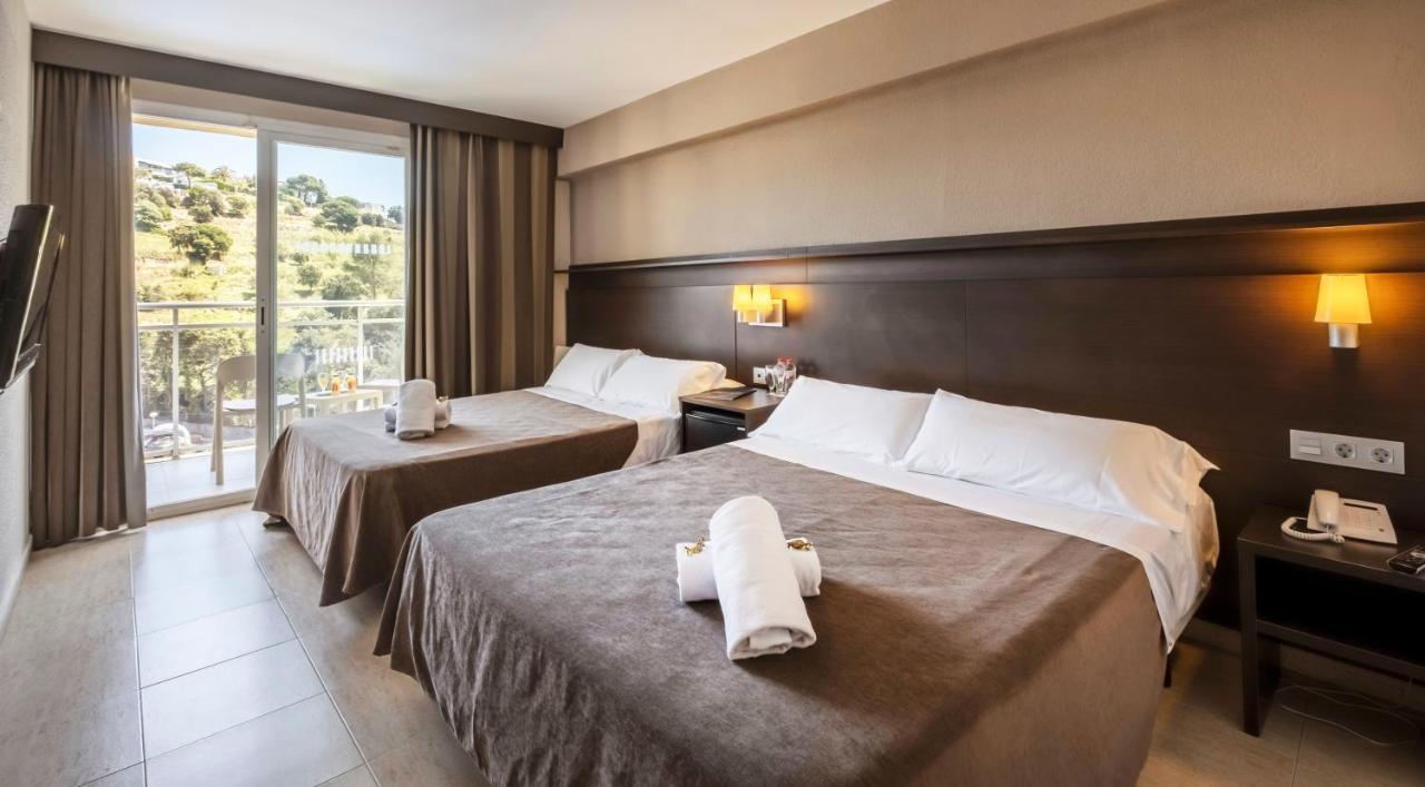 Habitación Doble con vistas a la piscina (2 adultos + 2 niños) - 2 camas