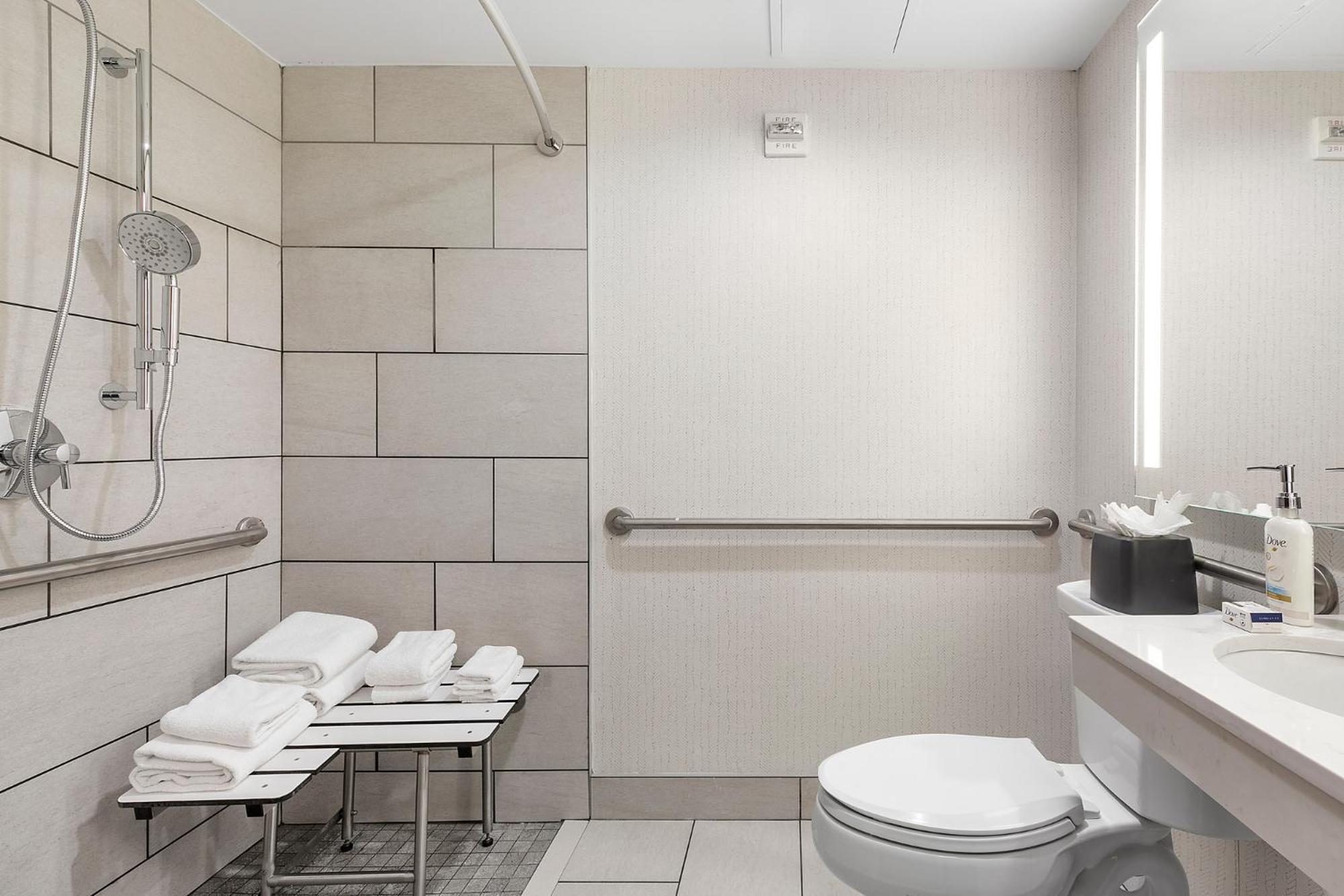 Standard Queen Room Communications Accessible Roll Shower
