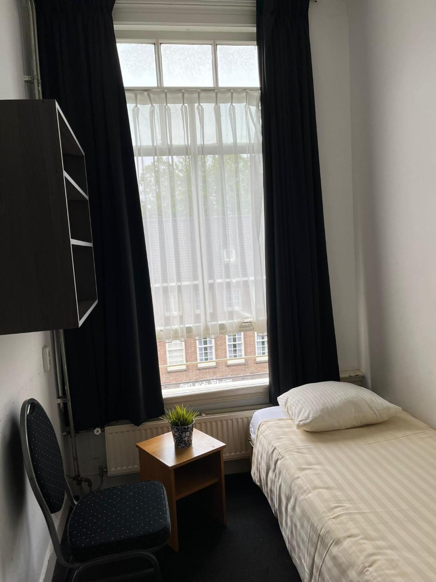 Eenpersoonskamer met Gedeelde Badkamer
