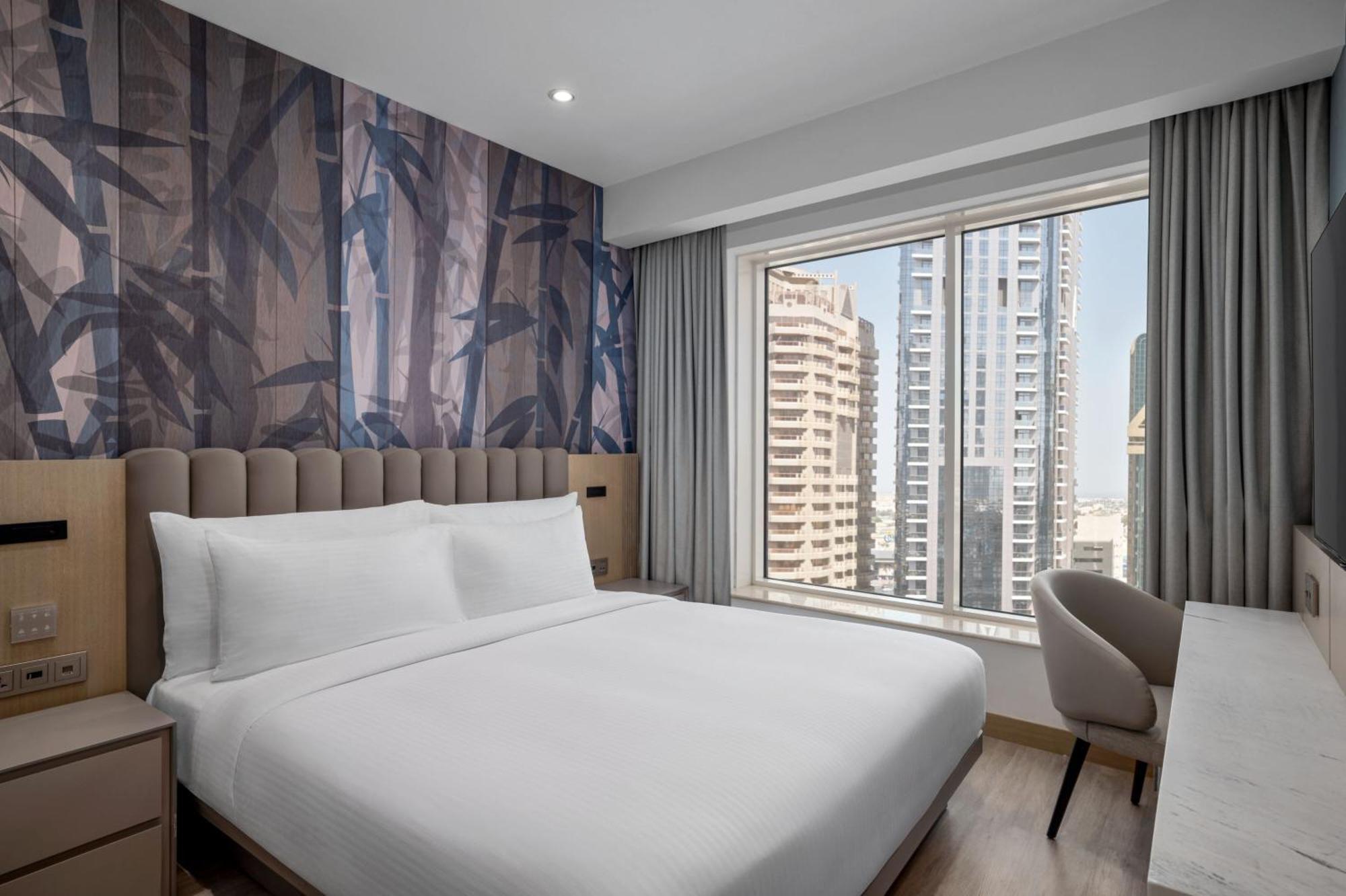 One Bedroom Suite 1 Queen Bed City View Includes Food & Beverage
