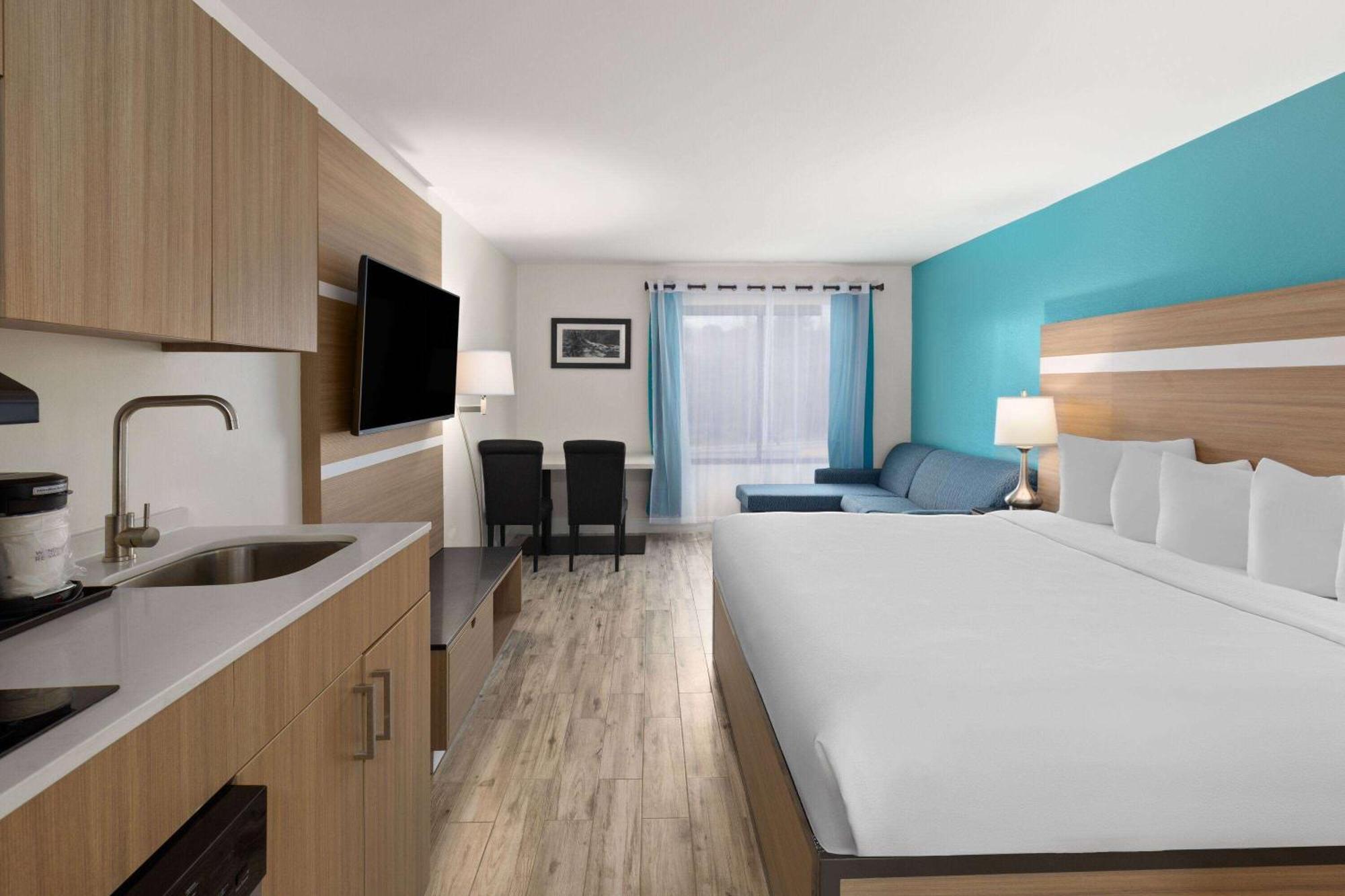 King Room With One King Bed and One Sofa Bed and Kitchenette - Non-Smoking,1636756506:JPEG