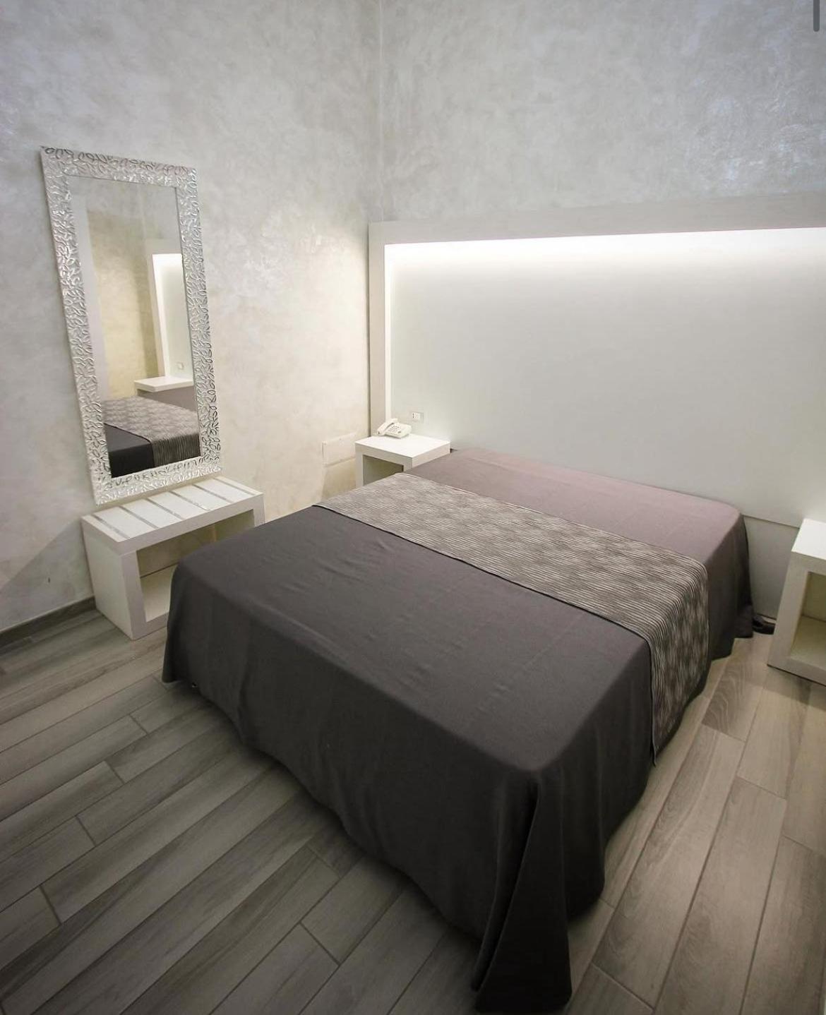 Doppel- oder Zweibettzimmer
