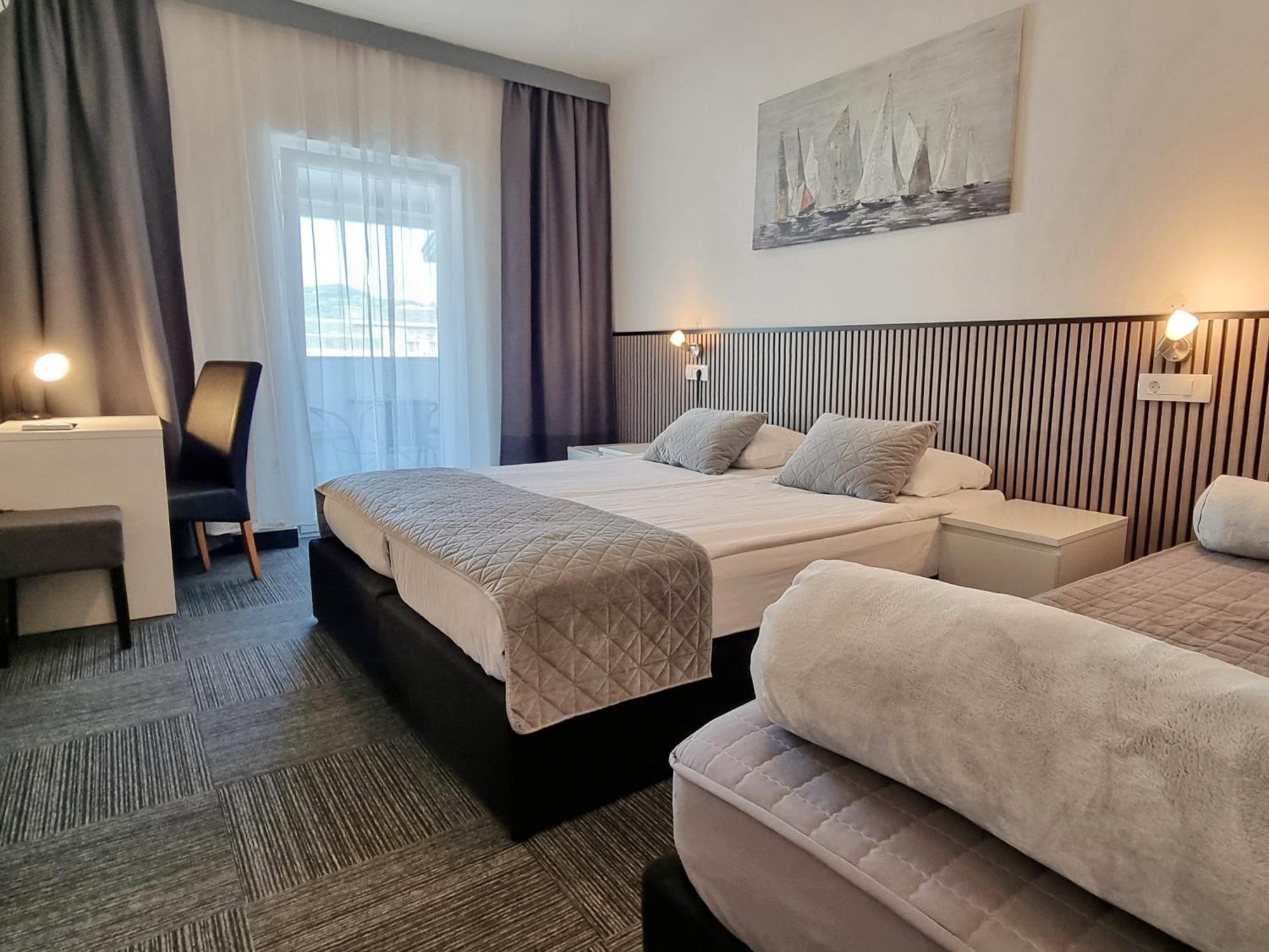 Standard Triple Room with Balcony