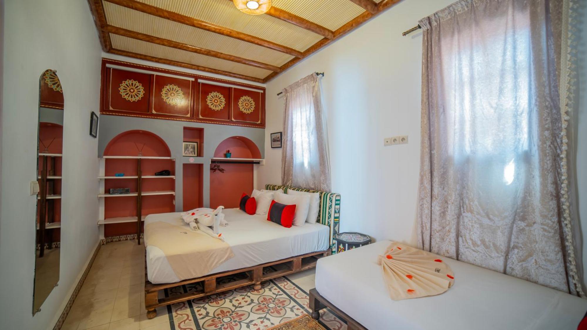 Deluxe Triple Room