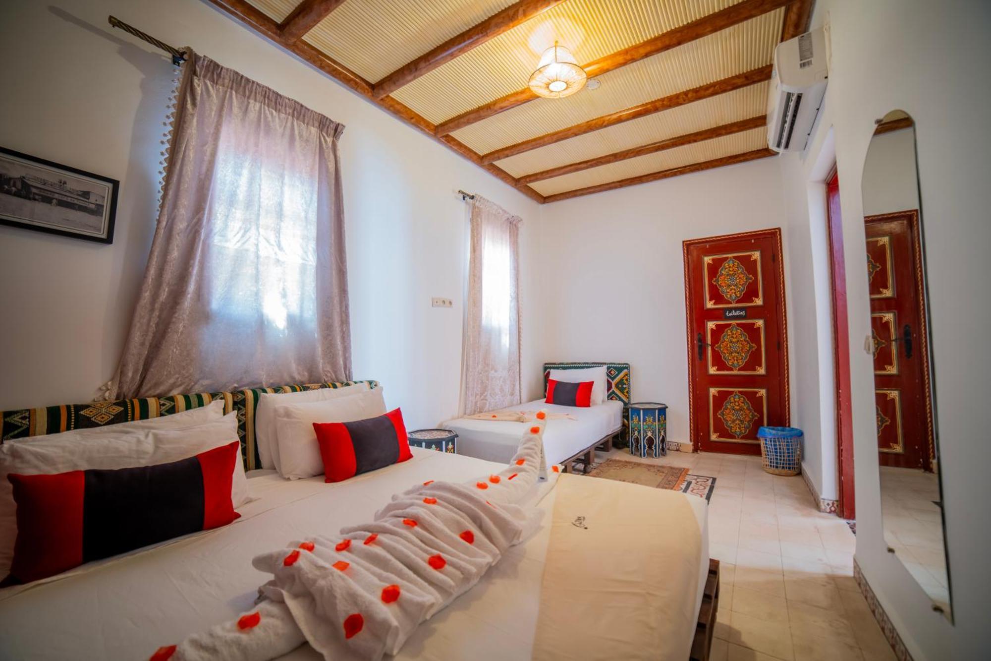 Deluxe Triple Room