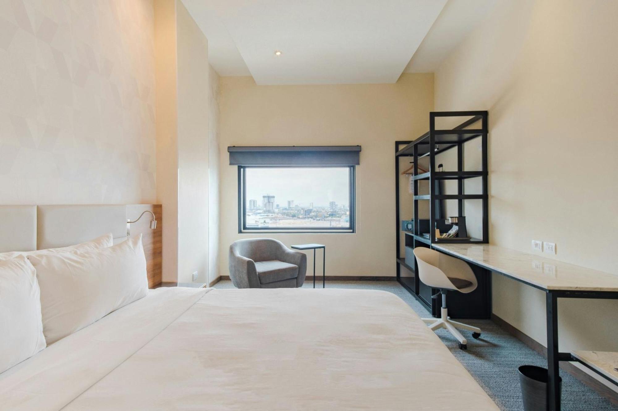 Habitación Executive con cama extragrande y vistas a la ciudad