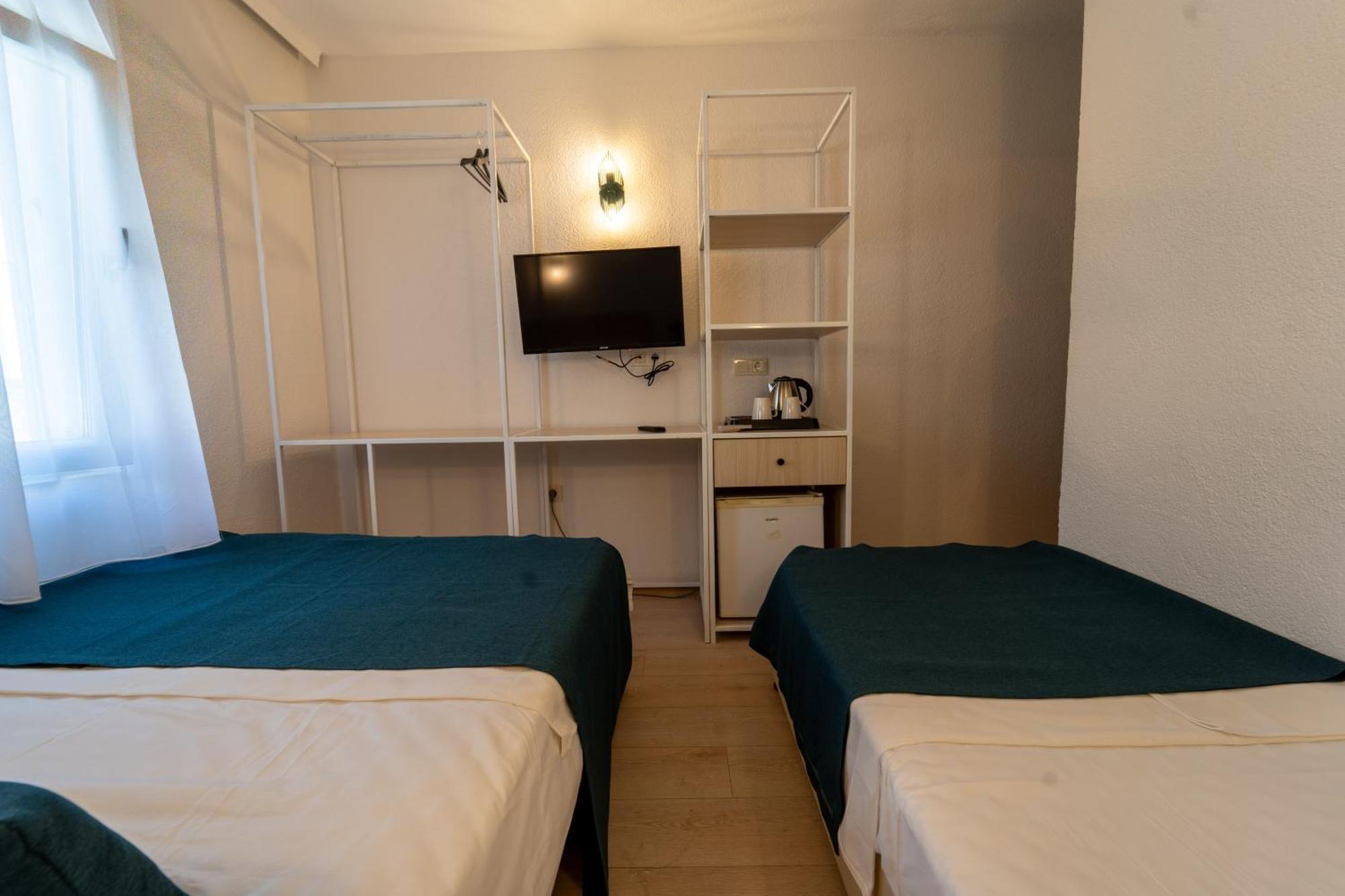 Quarto Triplo com Vista da Cidade