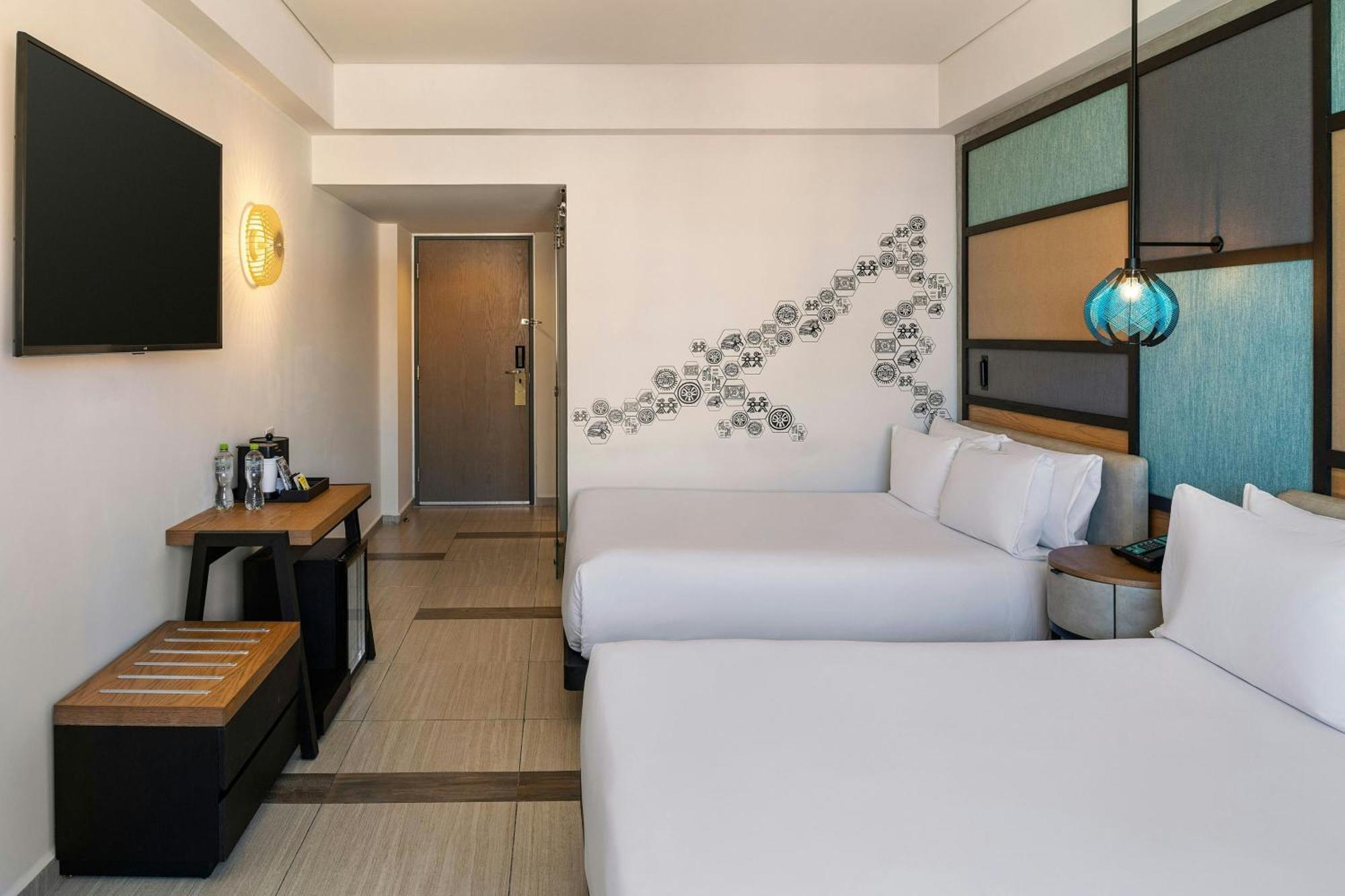 Aloft Partial View Guest room 2 Queen Complimentary open bar