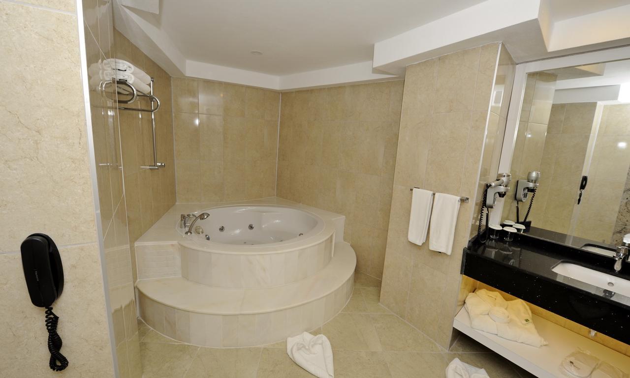 Suite con cama extragrande