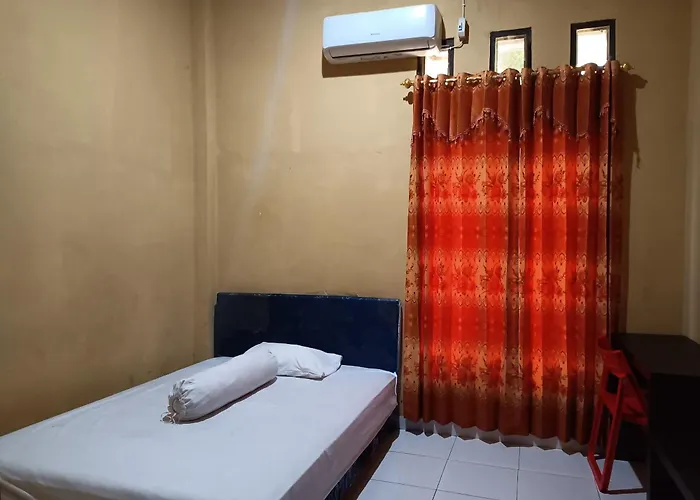 Oyo 93073 Penginapan 69