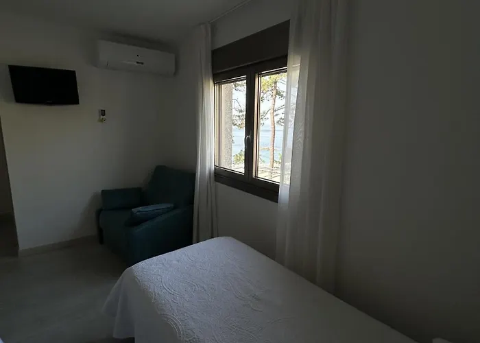 Habitaciones A Postiña